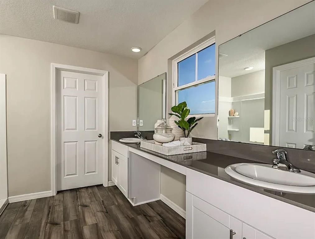 Bathroom, Dual Sink Vanities, Interior, Recessed Lighting, Wood Texture Flooring