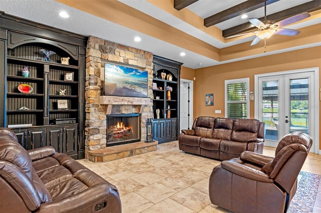 Fireplace, Interior, Living room, Recessed Lighting, Stone Walls, Wooden Beams