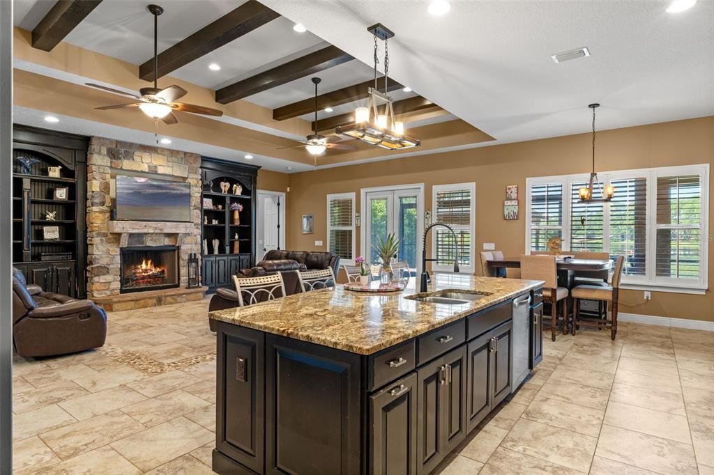 Dining room, Fireplace, Interior, Kitchen, Living room, Pendant Lights, Recessed Lighting, Stone Walls, Wooden Beams