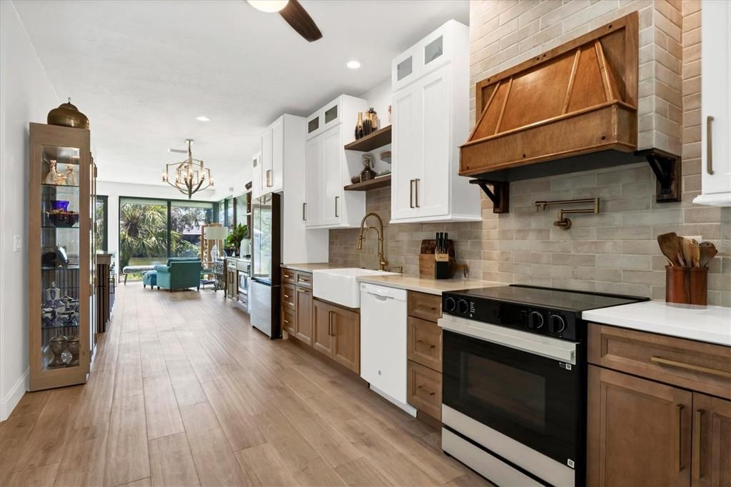 Chandelier, Interior, Kitchen, Recessed Lighting, Stainless Steel Appliances, Wood Texture Flooring