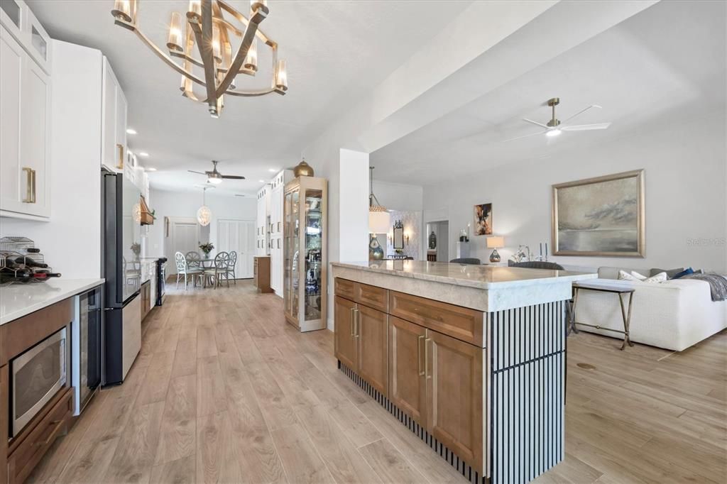 Chandelier, Dining room, Interior, Living room, Pendant Lights, Recessed Lighting, Wood Texture Flooring