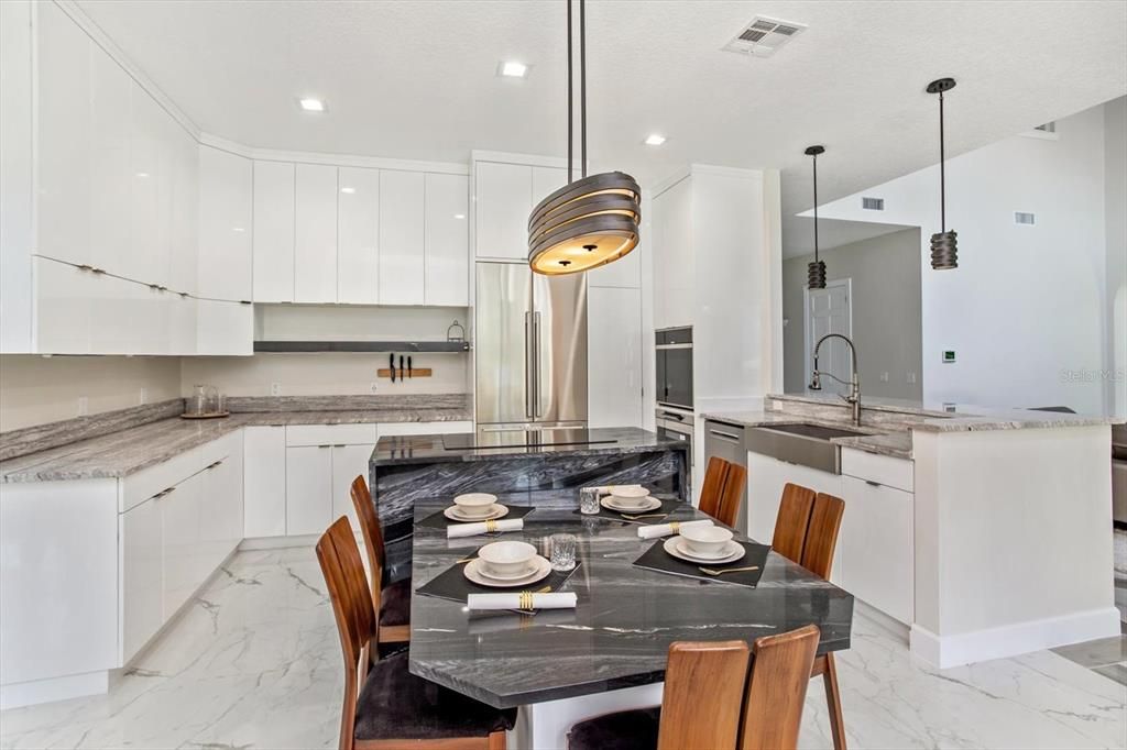 Dining room, Interior, Kitchen, Marble, Pendant Lights, Recessed Lighting, Stainless Steel Appliances