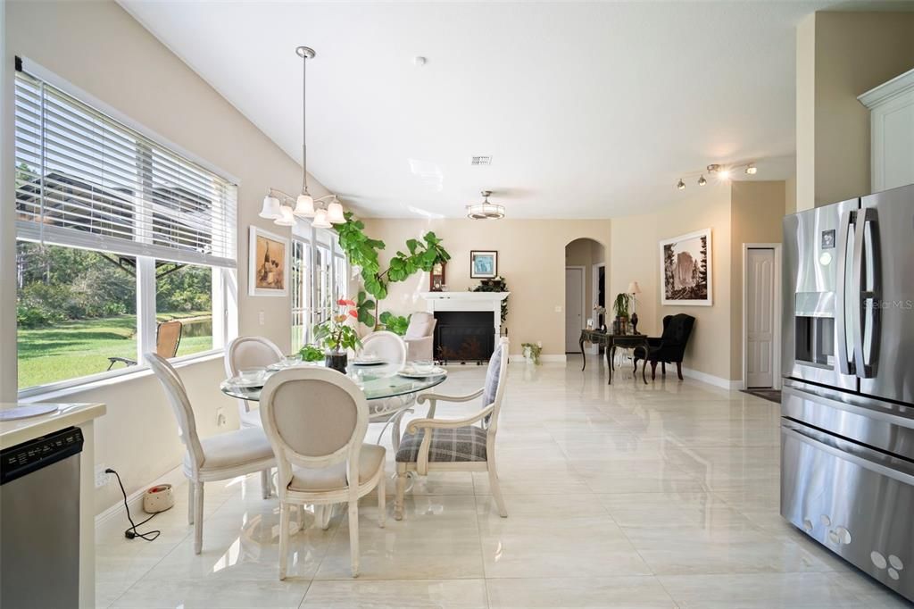 Dining room, Fireplace, Interior, Kitchen, Pendant Lights, Stainless Steel Appliances