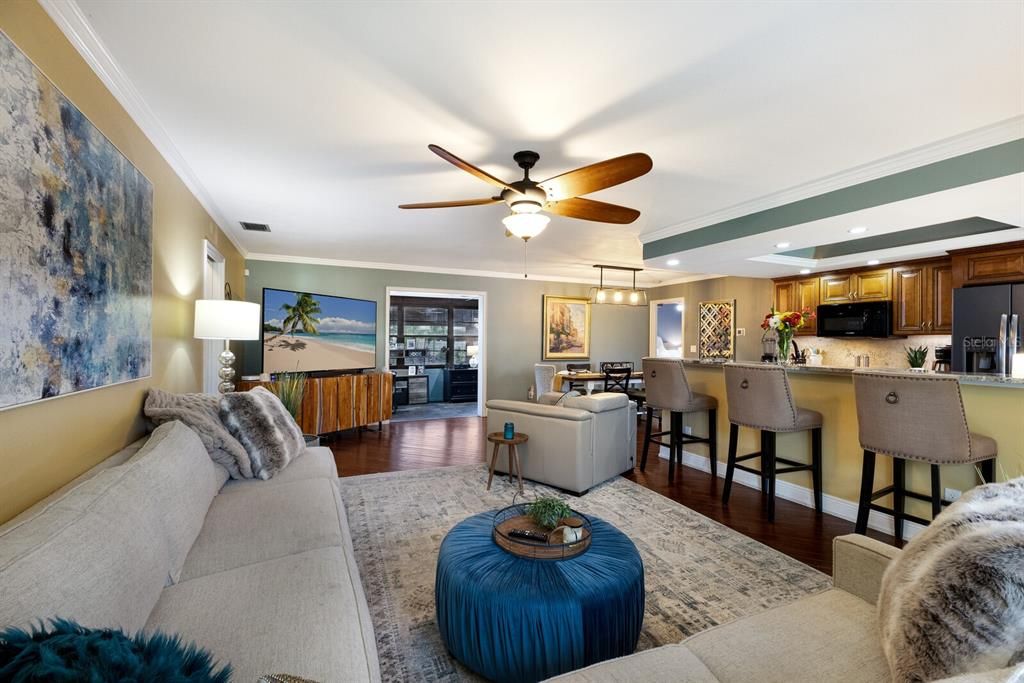 Dining room, Interior, Kitchen, Living room, Recessed Lighting, Stainless Steel Appliances, Wood Texture Flooring