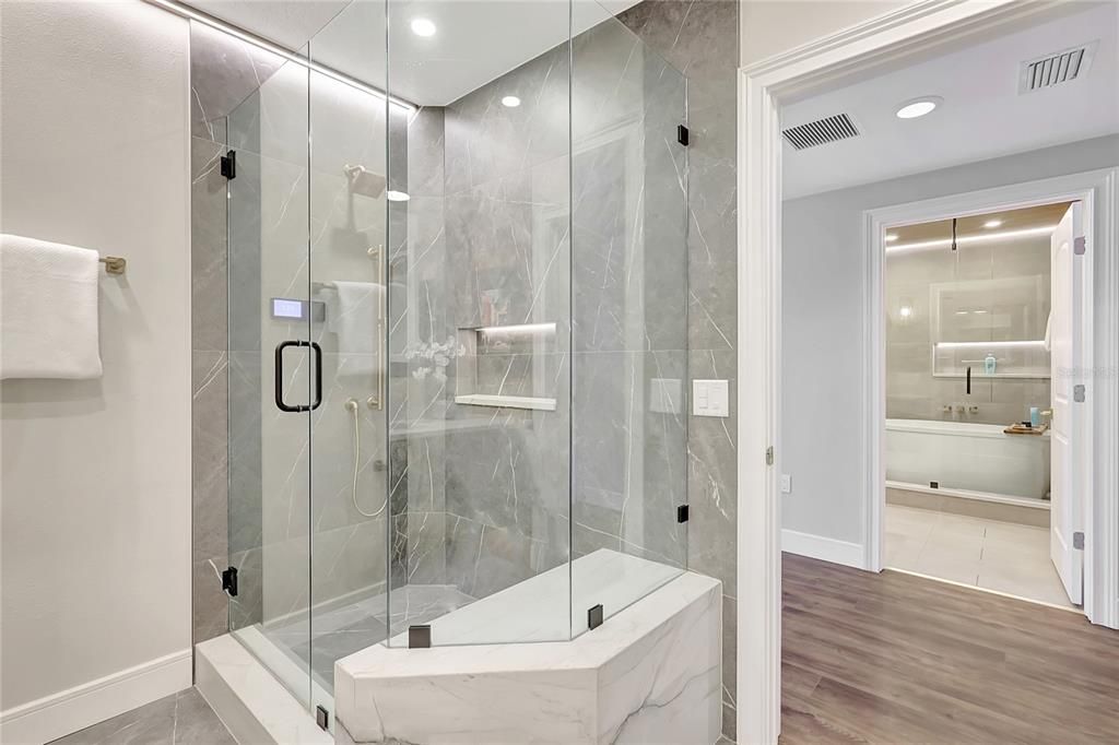 Bathroom, Glass Shower, Interior, Marble Walls, Recessed Lighting, Wood Texture Flooring
