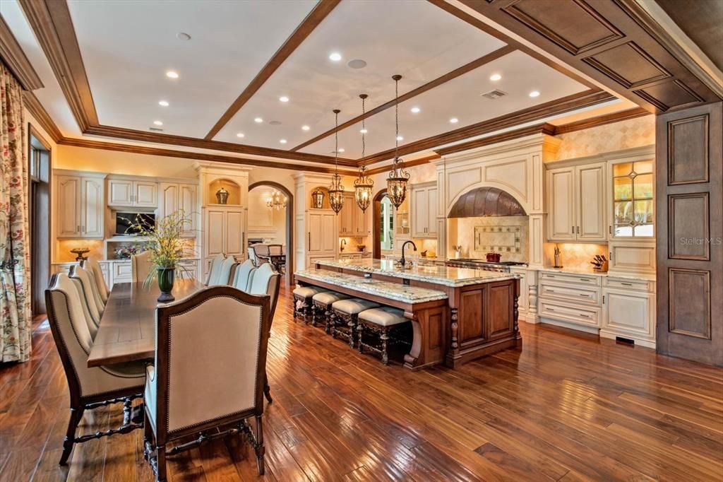Dining room, Interior, Kitchen, Pendant Lights, Recessed Lighting, Stainless Steel Appliances, Wood Texture Flooring