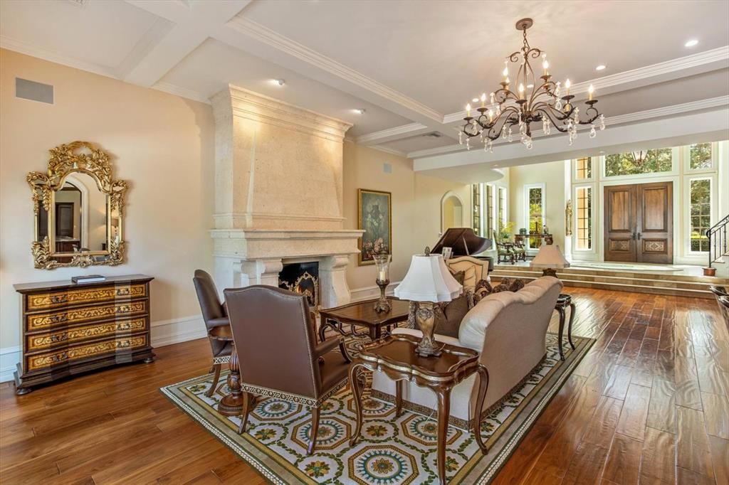 Chandelier, Dining room, Fireplace, Interior, Living room, Recessed Lighting, Wood Texture Flooring