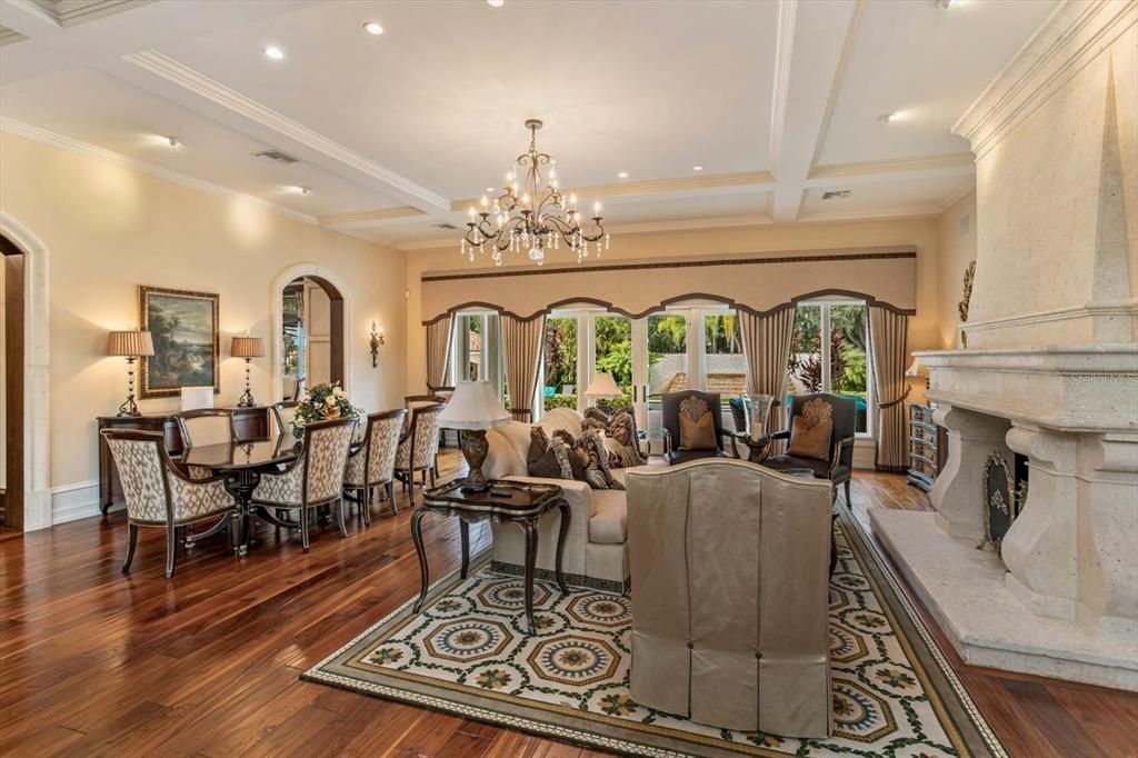 Chandelier, Dining room, Fireplace, Interior, Living room, Recessed Lighting, Wood Texture Flooring