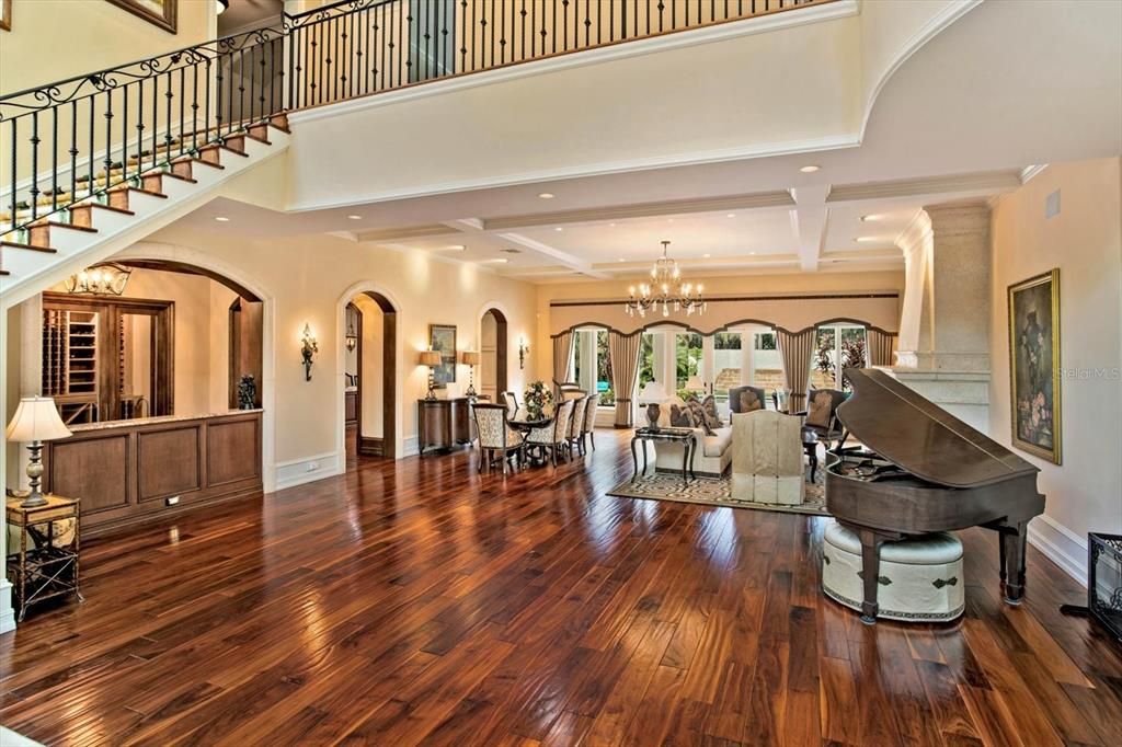 Chandelier, Dining room, Interior, Living room, Piano, Recessed Lighting, Wood Texture Flooring