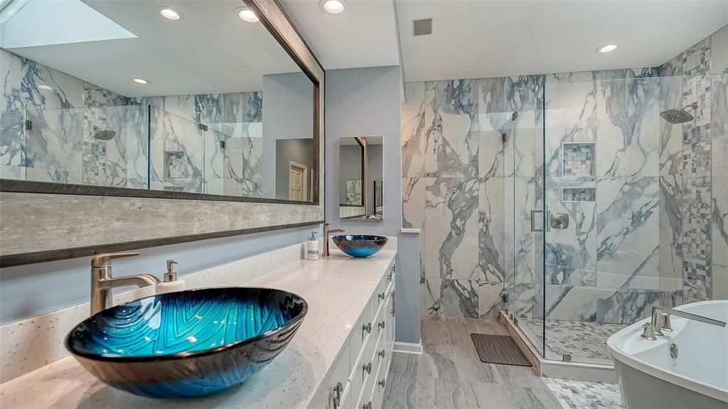Bathroom, Dual Sink Vanities, Free Standing Baths, Glass Shower, Interior, Marble Walls, Recessed Lighting