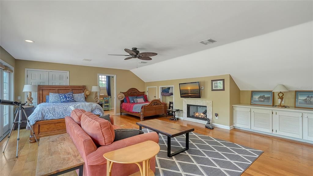 Bedroom, Fireplace, Interior, Living room, Recessed Lighting, Wood Texture Flooring