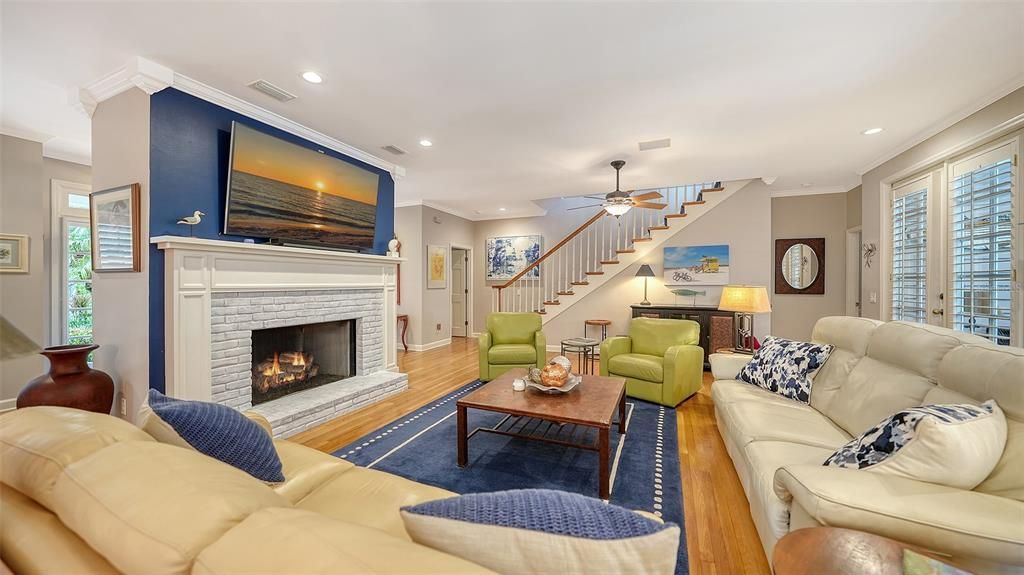 Fireplace, Interior, Living room, Recessed Lighting, Wood Texture Flooring