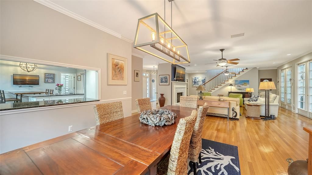 Dining room, Fireplace, Interior, Living room, Pendant Lights, Recessed Lighting, Wood Texture Flooring