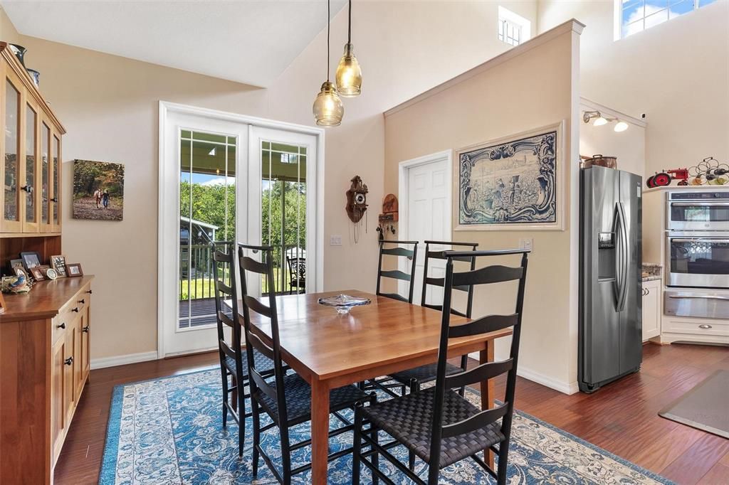 Dining room, Interior, Kitchen, Pendant Lights, Stainless Steel Appliances, Wood Texture Flooring