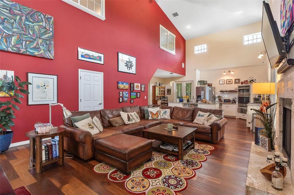 Fireplace, Interior, Kitchen, Living room, Recessed Lighting, Wood Texture Flooring