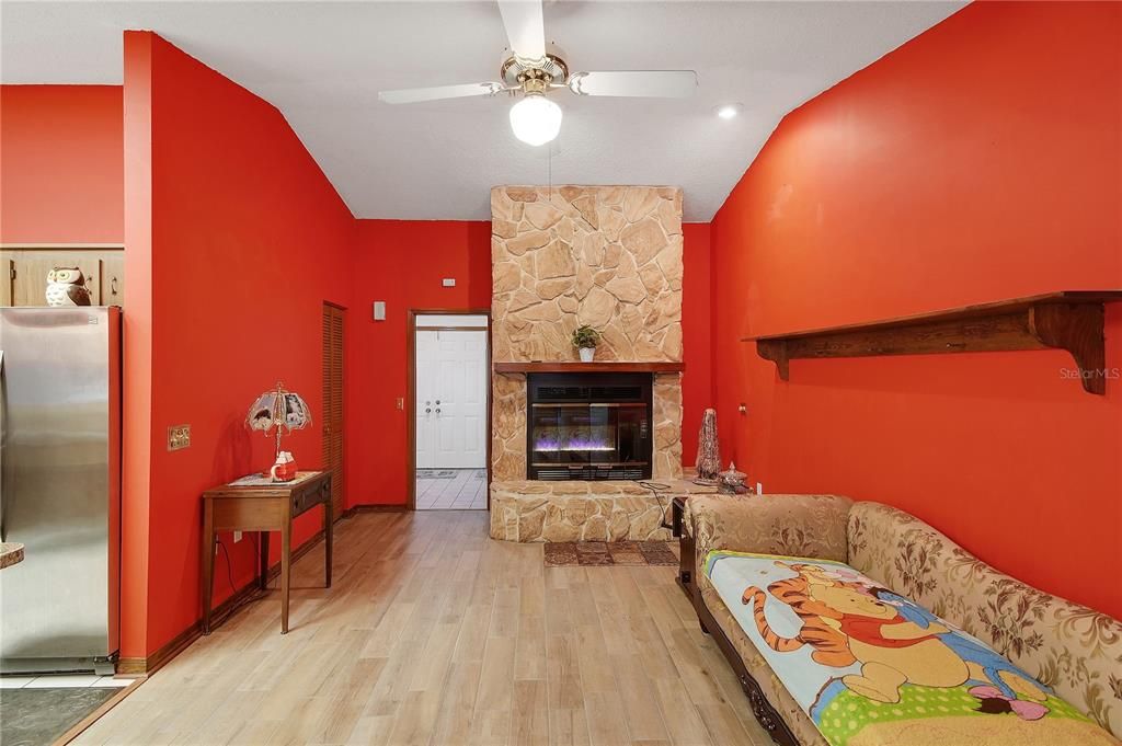 Fireplace, Interior, Recessed Lighting, Stone Walls, Wood Texture Flooring