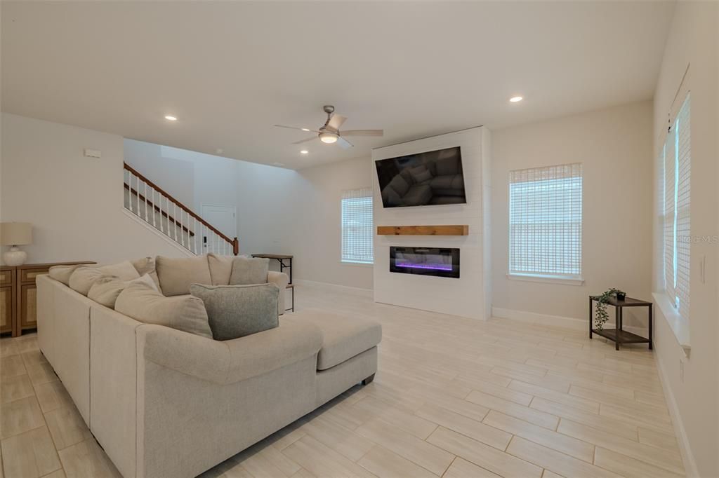 Fireplace, Interior, Living room, Recessed Lighting, Wood Texture Flooring