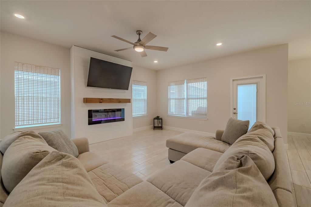 Fireplace, Interior, Living room, Recessed Lighting, Wood Texture Flooring