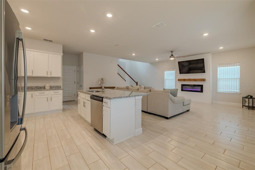 Fireplace, Interior, Kitchen, Living room, Recessed Lighting, Wood Texture Flooring