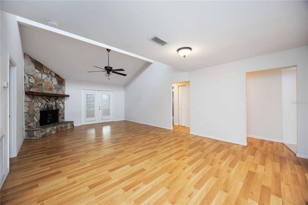 Empty room, Fireplace, Interior, Stone Walls, Wood Texture Flooring