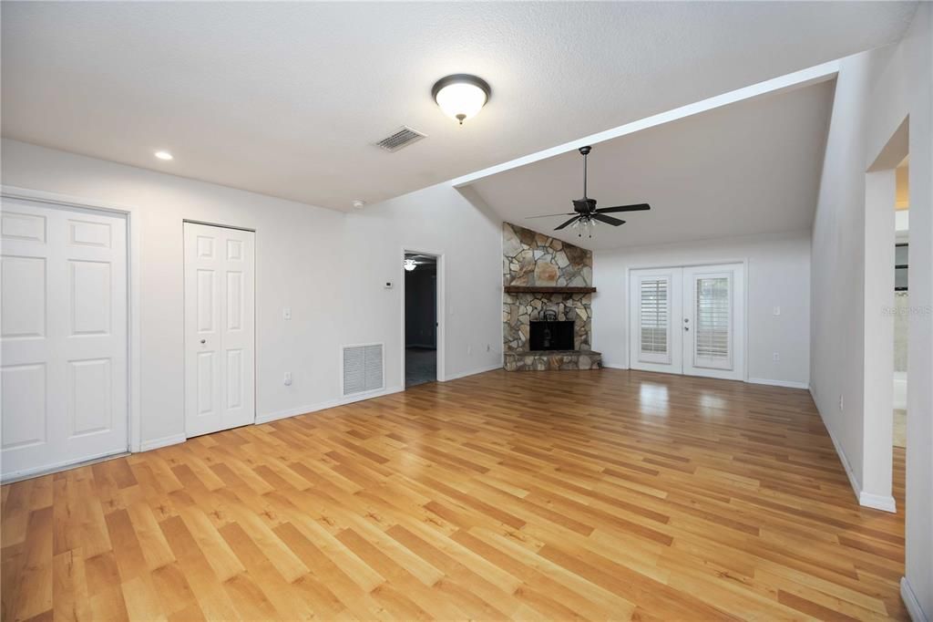Empty room, Fireplace, Interior, Recessed Lighting, Wood Texture Flooring