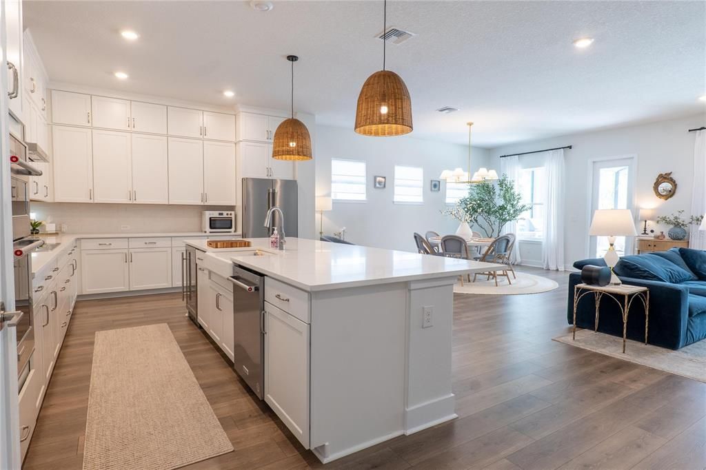 Dining room, Interior, Kitchen, Pendant Lights, Recessed Lighting, Stainless Steel Appliances, Wood Texture Flooring