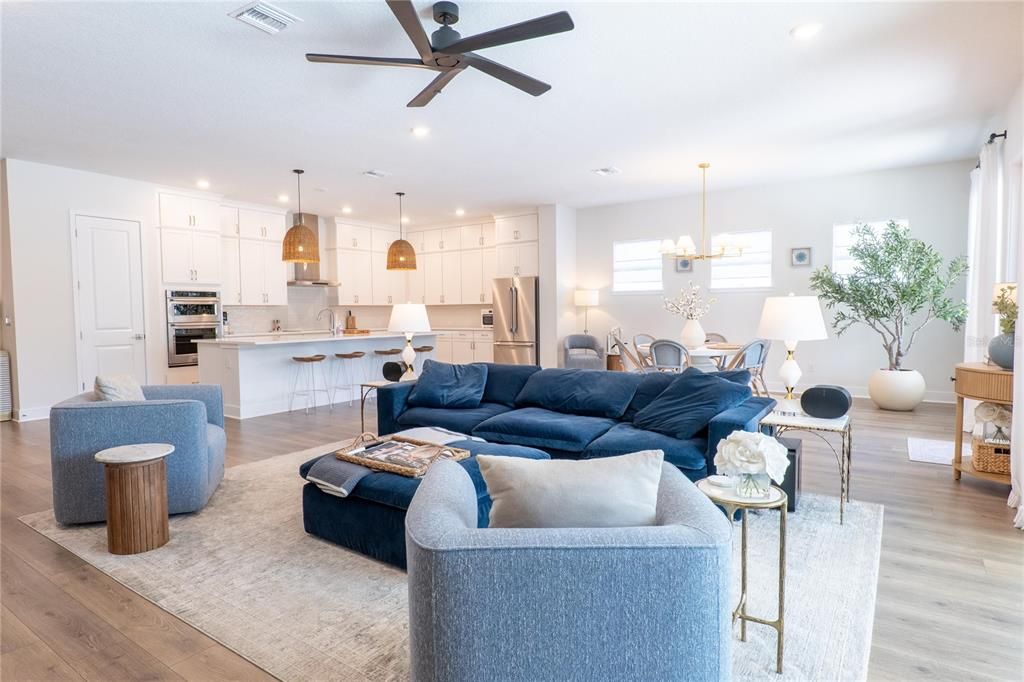 Dining room, Interior, Kitchen, Living room, Pendant Lights, Recessed Lighting, Stainless Steel Appliances, Wood Texture Flooring