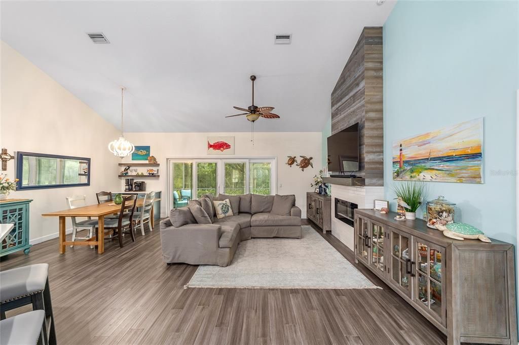 Dining room, Fireplace, Interior, Living room, Pendant Lights, Wood Texture Flooring