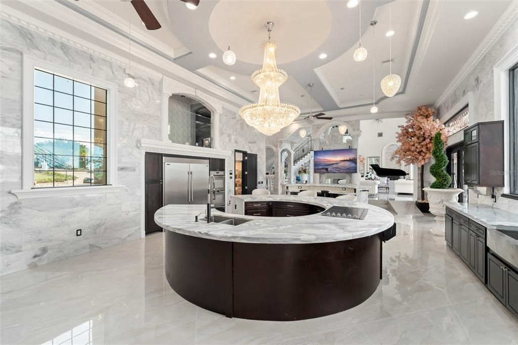 Interior, Kitchen, Marble, Marble Walls, Pendant Lights, Recessed Lighting, Stainless Steel Appliances