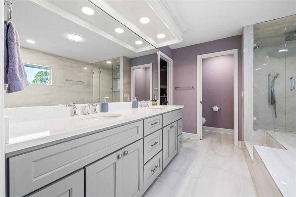 Bathroom, Dual Sink Vanities, Glass Shower, Interior, Marble, Marble Walls, Recessed Lighting