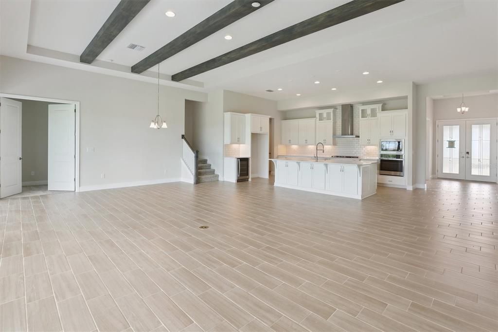 Empty room, Interior, Kitchen, Pendant Lights, Recessed Lighting, Wooden Beams, Wood Texture Flooring