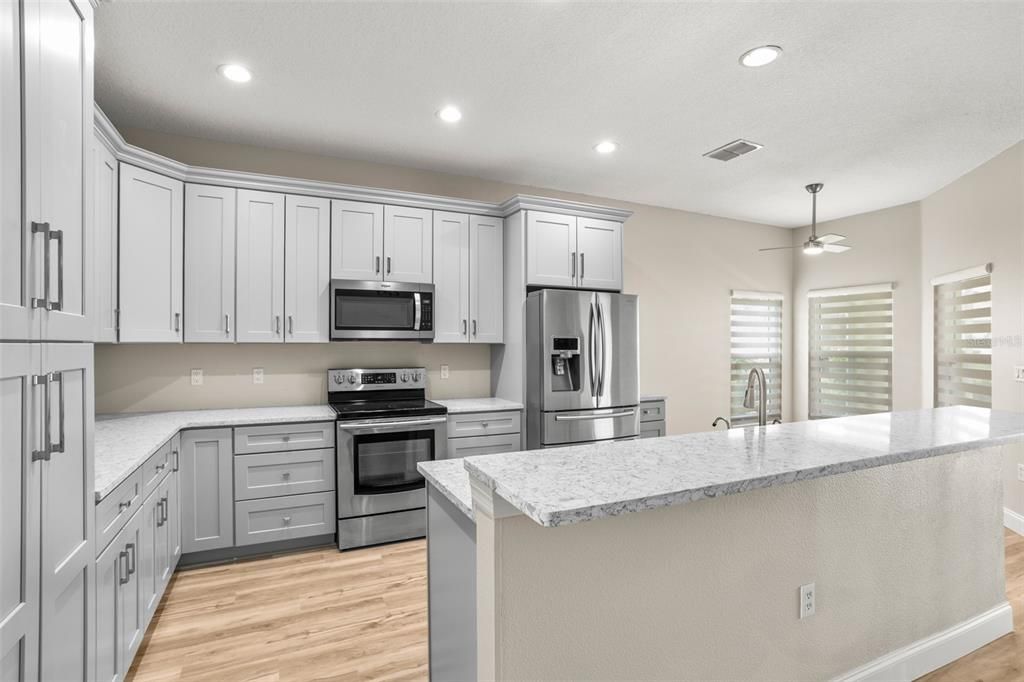 Interior, Kitchen, Recessed Lighting, Stainless Steel Appliances, Wood Texture Flooring