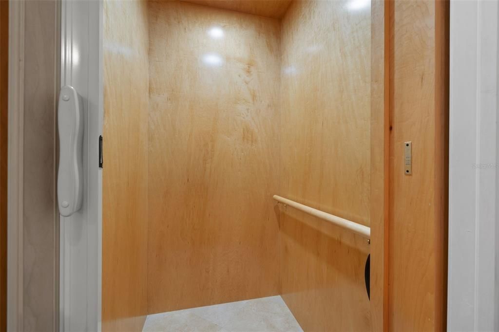 Elevator, Interior, Recessed Lighting, Wooden Walls