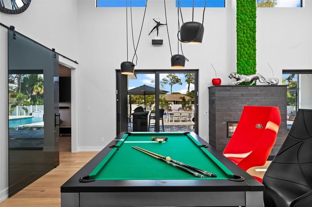 Billiard Table, Fireplace, Game Room, Interior, Pendant Lights, Wood Texture Flooring