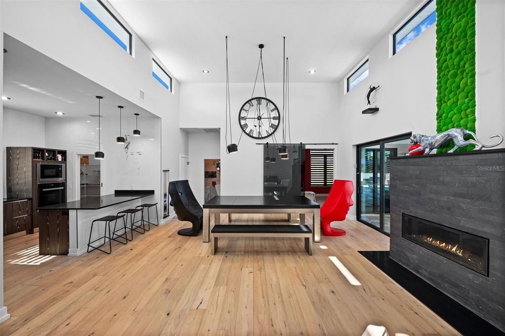 Dining room, Fireplace, Interior, Kitchen, Pendant Lights, Recessed Lighting, Wood Texture Flooring