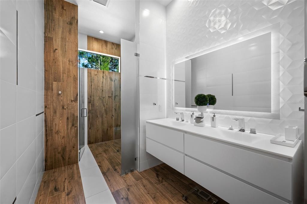 Bathroom, Dual Sink Vanities, Glass Shower, Interior, Recessed Lighting, Wood Texture Flooring, Wooden Walls