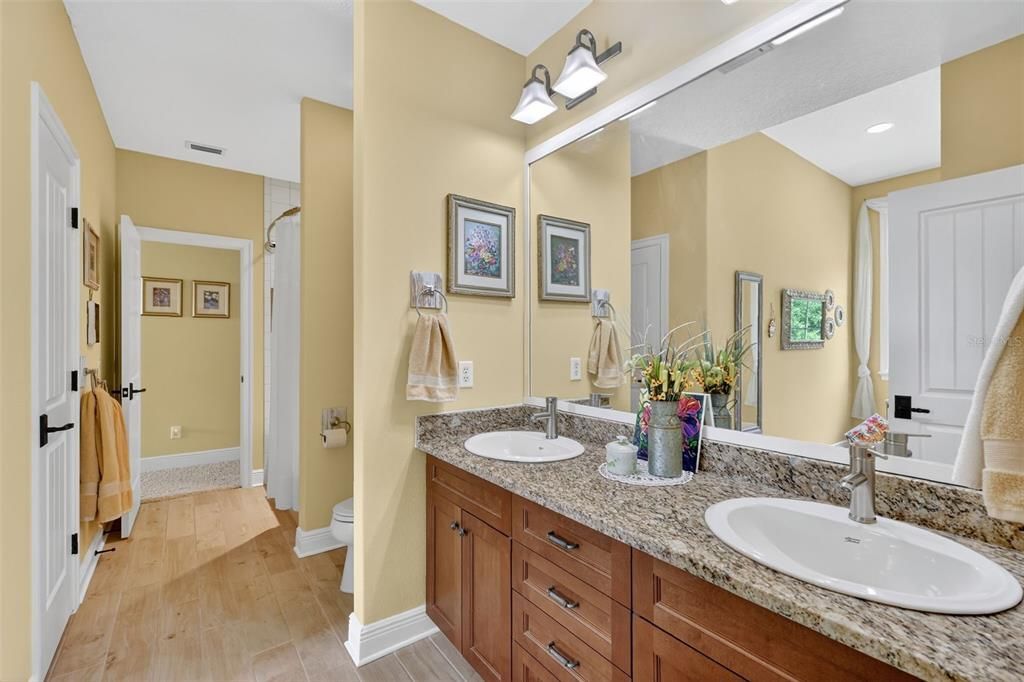 Bathroom, Dual Sink Vanities, Interior, Recessed Lighting, Wood Texture Flooring