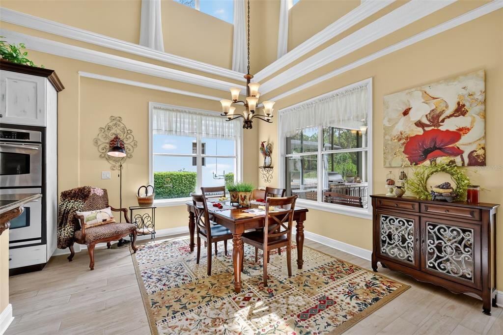 Chandelier, Dining room, Interior, Stainless Steel Appliances, Wood Texture Flooring