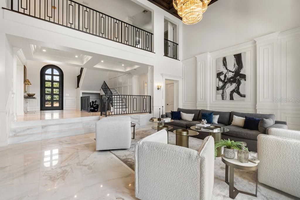 Chandelier, Fireplace, Interior, Living room, Marble, Piano, Recessed Lighting