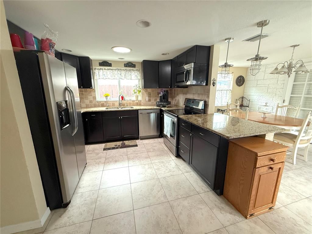 Dining room, Interior, Kitchen, Pendant Lights, Recessed Lighting, Stainless Steel Appliances