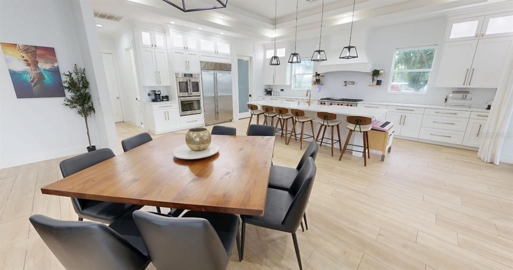 Dining room, Interior, Kitchen, Pendant Lights, Recessed Lighting, Stainless Steel Appliances, Wood Texture Flooring