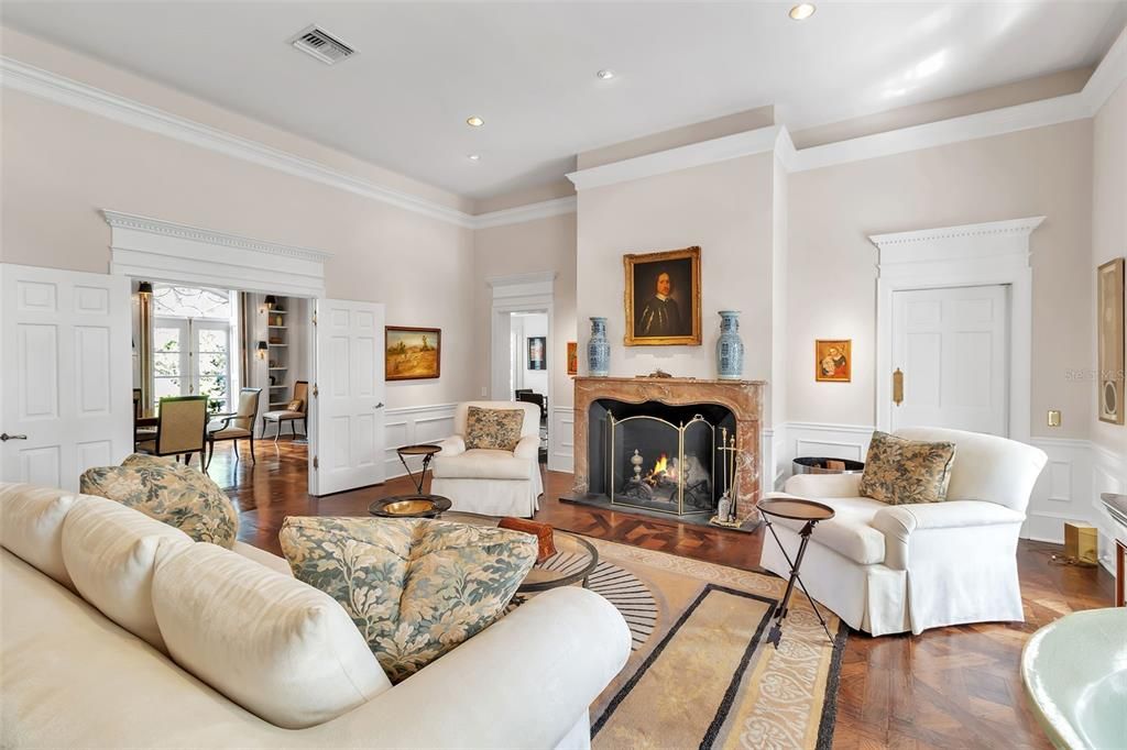 Dining room, Fireplace, Interior, Living room, Recessed Lighting, Wood Texture Flooring
