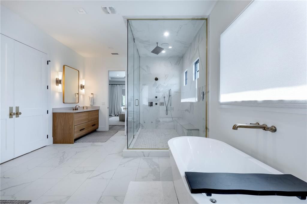 Bathroom, Free Standing Baths, Glass Shower, Interior, Marble, Marble Walls, Recessed Lighting