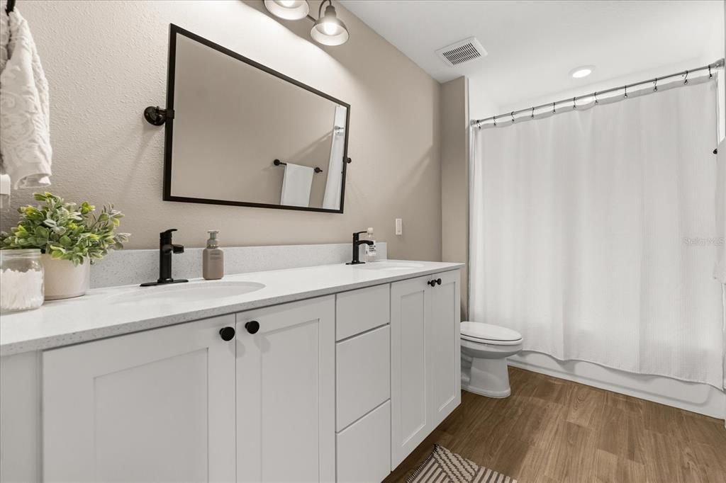 Bathroom, Dual Sink Vanities, Interior, Recessed Lighting, Wood Texture Flooring