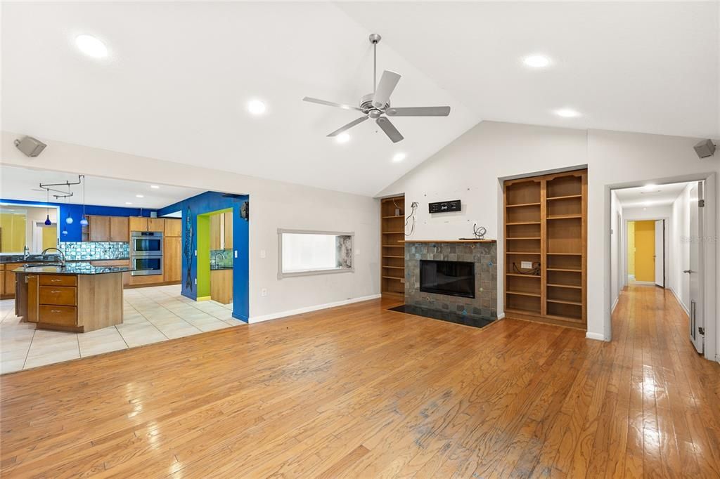 Empty room, Fireplace, Interior, Kitchen, Recessed Lighting, Wood Texture Flooring