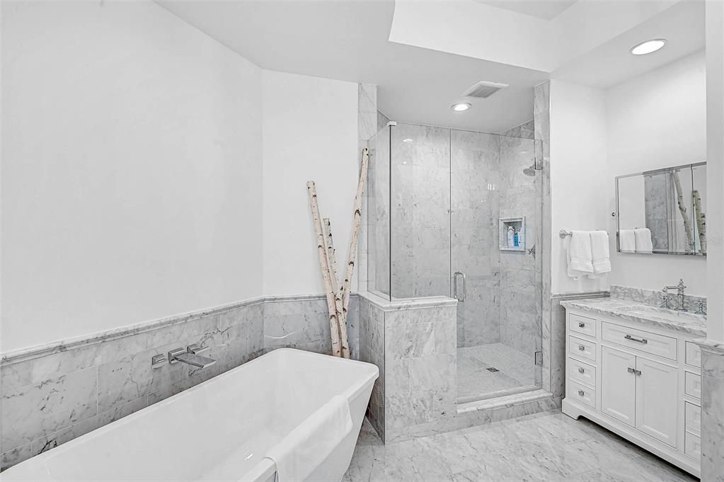 Bathroom, Free Standing Baths, Glass Shower, Interior, Marble, Marble Walls, Recessed Lighting