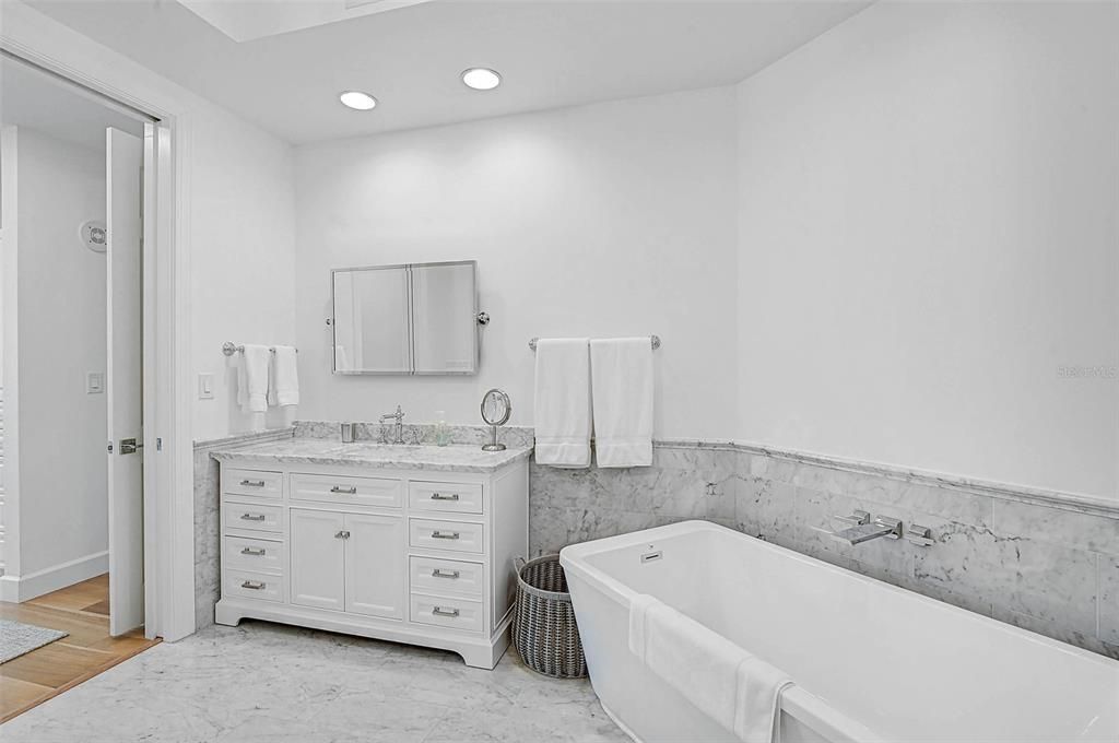 Bathroom, Free Standing Baths, Interior, Marble, Recessed Lighting, Wood Texture Flooring