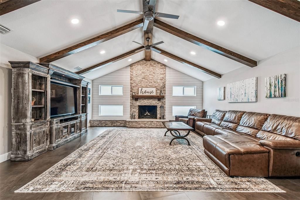 Fireplace, Interior, Living room, Recessed Lighting, Stone Walls, Wooden Beams, Wood Texture Flooring