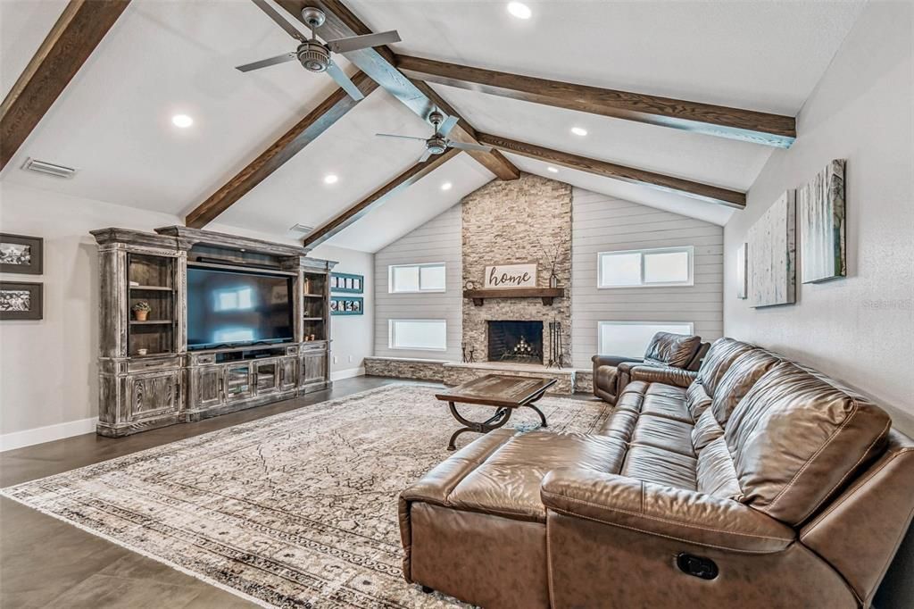 Fireplace, Interior, Living room, Recessed Lighting, Stone Walls, Wooden Beams, Wood Texture Flooring