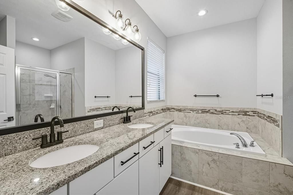 Bathroom, Dual Sink Vanities, Interior, Recessed Lighting, Wood Texture Flooring